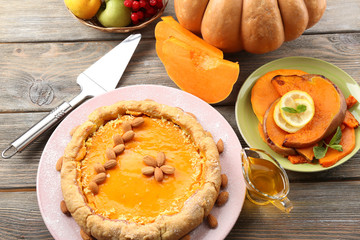 Homemade pumpkin pie on table