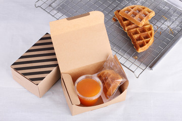 stacked homemade waffles on sieve