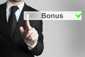 businessman pushing flat button bonus checked