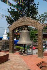 Obraz premium Bell in Swayambhunath religious complex aka Monkey Temple - ancient religious complex, on the west of Kathmandu city.