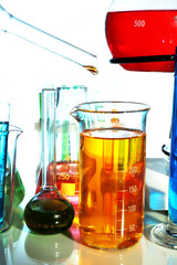 Laboratory glassware on light background