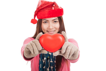 Asian girl with christmas hat show red heart