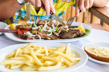 Greek meat with fried potatoes