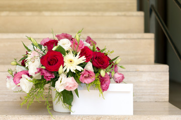 Envelope and flower bouquet