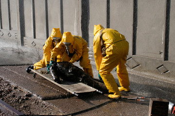Man in chemical protection suit