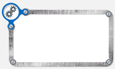 metal frame for text with screws and cogwheels