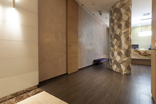 Interior of a corridor with mosaic pillar 