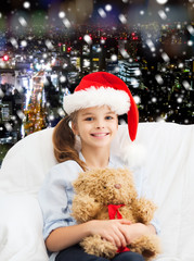 smiling little girl with teddy bear