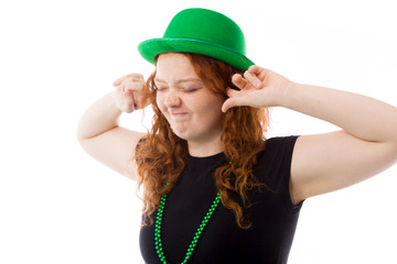 Naklejka premium model isolated on plain background plugging ears with fingers