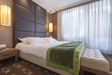Modern hotel bedroom interior 