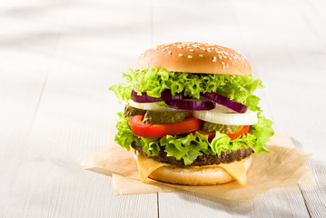 Homemade burger on the wooden table