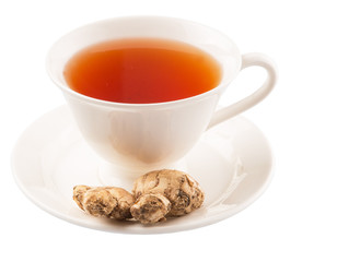 Ginger root and a cup of tea over white background