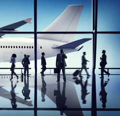 Silhouette Group of Business People with Airplane Concept