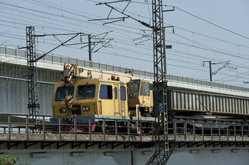 Fototapeta na wymiar Train cars and high-speed rail