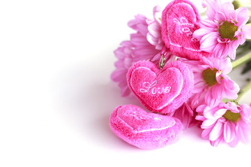 Obraz na płótnie Canvas valentine heart fabric with pink chrysanthemum- Stock Image