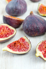 figs on wooden surface