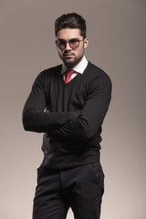 Fototapeta premium Handsome business man holding his arms crossed