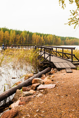 Fototapeta premium Ferry on lake in autumn