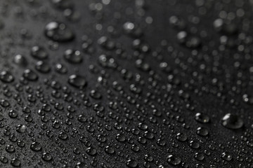 Water drops  black background, shallow depth of field