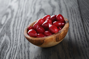 ripe cornel berrys in bowl