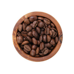 roasted coffee beans in olive wood bowl from above