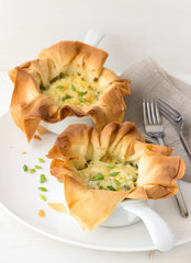 Onion mini tarts of filo pastry with cheese
