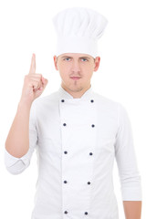 young handsome man chef showing idea sign isolated over white