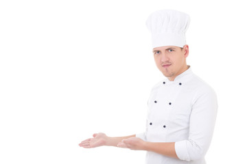 young handsome man chef showing or presenting something isolated