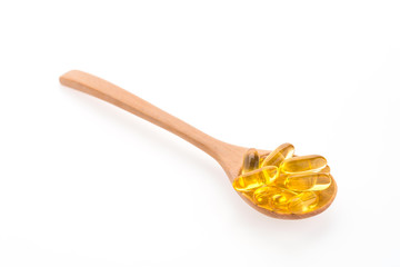 Fish oil in wooden spoon