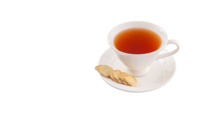 Ginger slices and a cup of tea over white background