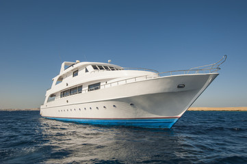 Obraz na płótnie Canvas Luxury motor yacht at sea