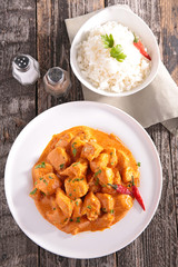 chicken cooked with curry sauce and rice