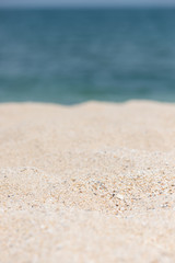 Fototapeta na wymiar Sandy beach and sea background