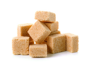 Cubes of cane sugar isolated on white background