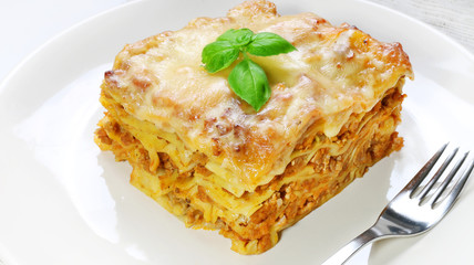 Lasagne with basil on white - 72252485