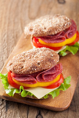 healthy sandwich with salami tomato pepper and lettuce