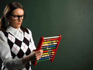 Female nerd with abacus