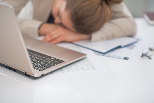 Closeup On Business Woman Sleeping At Desk