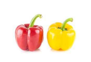 Obraz na płótnie Canvas Red and yellow sweet pepper on white