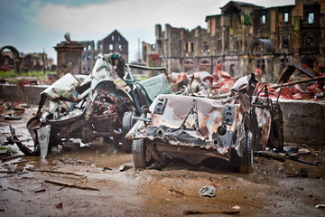 War devastation fear , scenery, wet, dirty, home town