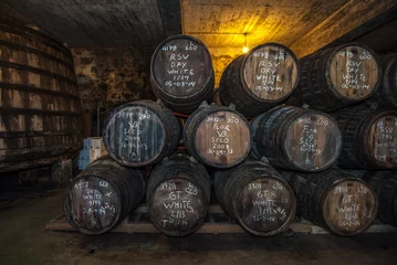 Gordijnen Sherry barrels in Jerez bodega, Spain © javarman
