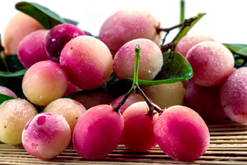Close up of carissa carandas L. tropical fruit (Scientific name