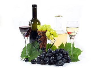 Fresh Grapes,Wine Glass Cups and Wine Bottles Filled with Wine