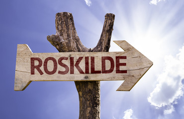 Roskilde wooden sign on a beautiful day