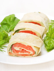 Salmon lavash rolls with cheese and herbs