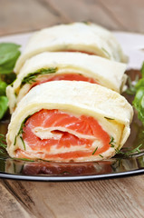 Salmon lavash rolls with cheese and herbs