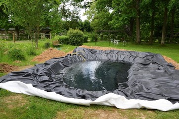 Construction d'un bassin de jardin - 72265614