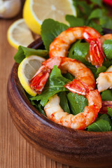 Salad with fried royal prawns with lemon