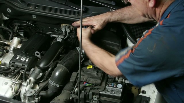 Car Repair Mechanic Assembling Automobile Air Filter