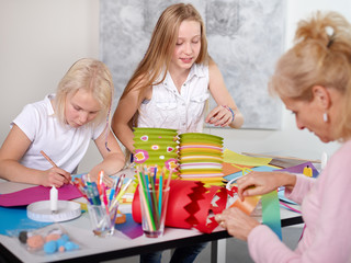 Kids making lamps for St. Martins Day
